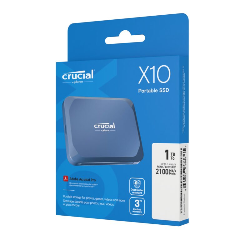 Blue packaging for a Crucial X10 1TB Type-C Portable SSD, featuring the image of the drive and highlights such as 1TB capacity, up to 2100 MB/s read speed, a 3-year warranty, and an Adobe Acrobat Pro offer. All text appears in both English and French.